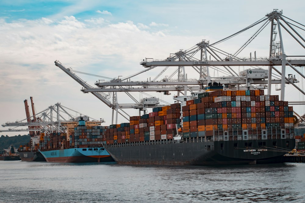 Container ship being loaded at port for shipment to Sri Lanka